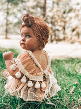 Surprise rainbow romper