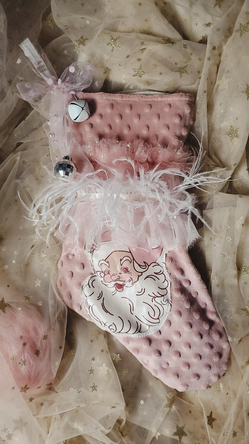 Blush santa with feathers